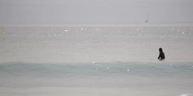 Surfers at the beach in Westport Massachusetts