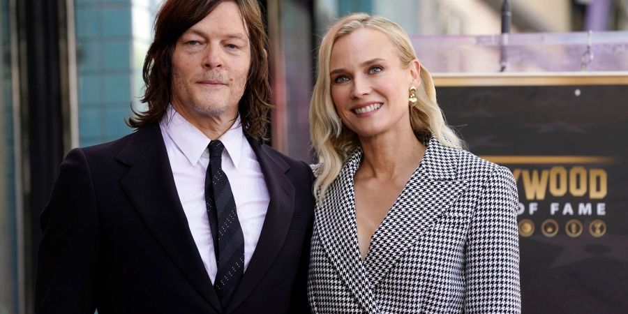 Der Schauspieler Norman Reedus (l) mit seiner Partnerin Diane Kruger.