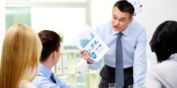 Chef, Mitarbeiter, Kollegen bei der Arbeit