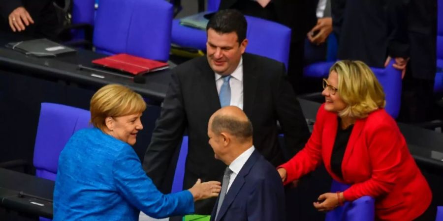 Merkel, Heil, Scholz und Schulze (v.l.)