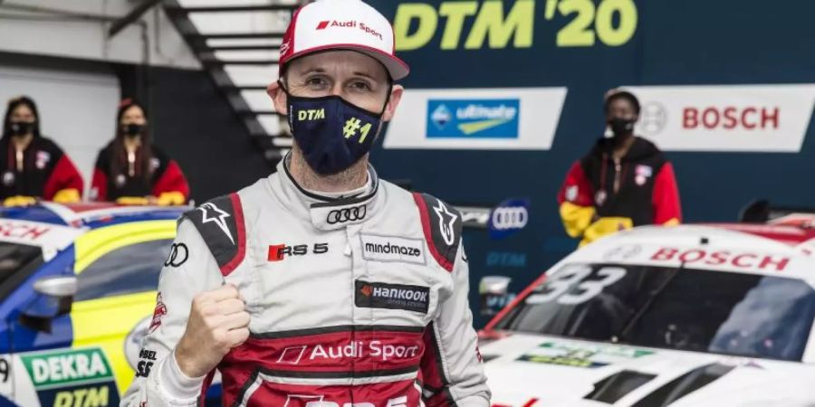 René Rast vom Audi Sport Team Rosberg jubelt in Zolder. Foto: Thomas Suer/Hoch Zwei/ITR/DTM/dpa