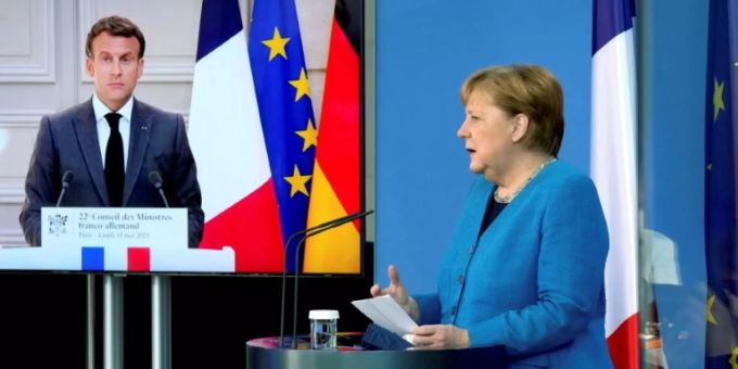 Merkel und Macron bei ihrer gemeinsamen Pressekonferenz Merkel und Macron bei ihrer gemeinsamen Pressekonferenz