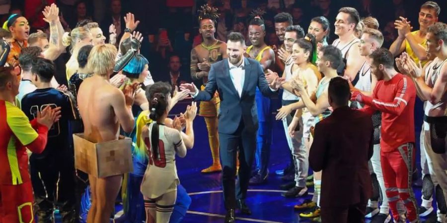 Vom Fussballplatz in die Manege: Lionel Messi (M). Foto: JorgeAndreu/Cirque du Soleil/Messi10/dpa