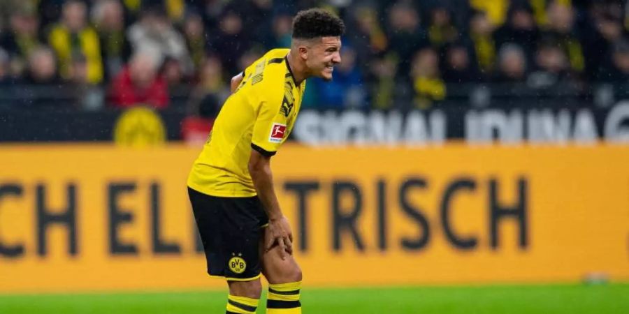 Dortmunds Jadon Sancho litt in der Partie gegen RB Leipzig unter Krämpfen. Foto: Guido Kirchner/dpa