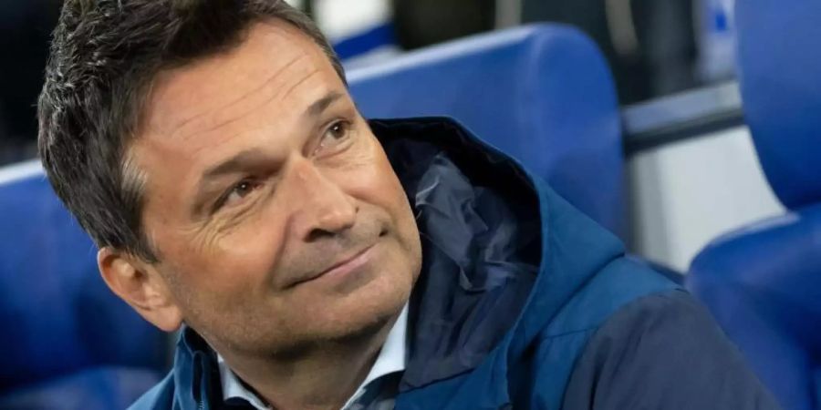 Schaut den Königsklassen-Duellen mit ManCity optimistisch entgegen: Schalke-Manager Christian Heidel. Foto: Bernd Thissen