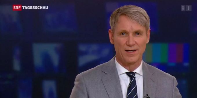 Franz Fischlin hat bei der Tagesschau-Moderation eine Narbe auf der Stirn. Franz Fischlin SRF