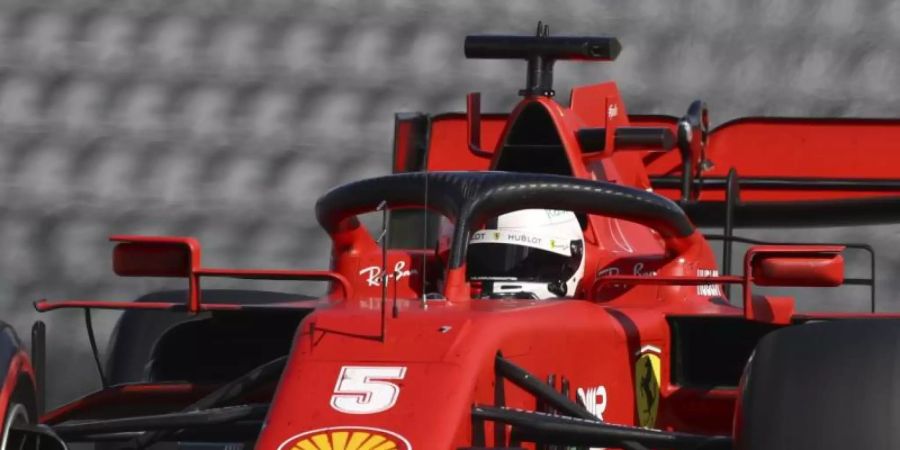 Sebastian Vettel erlebte im Ferrari in Österreich eine Frustfahrt. Foto: Mark Thompson/pool Getty/AP/dpa