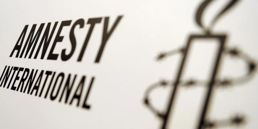 Das Logo der Organisation Amnesty International. Foto: Britta Pedersen/dpa-Zentralbild/dpa