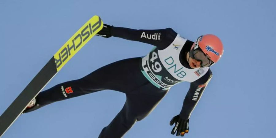 Hat nur noch sporadische Chancen auf das Gelbe Trikot: Skispringer Karl Geiger. Foto: Geir Olsen/NTB scanpix/dpa