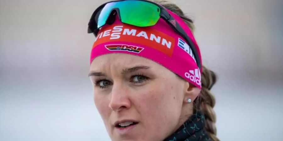 Putzt, statt zu tauchen: Biathletin: Denise Herrmann. Foto: Sven Hoppe/dpa