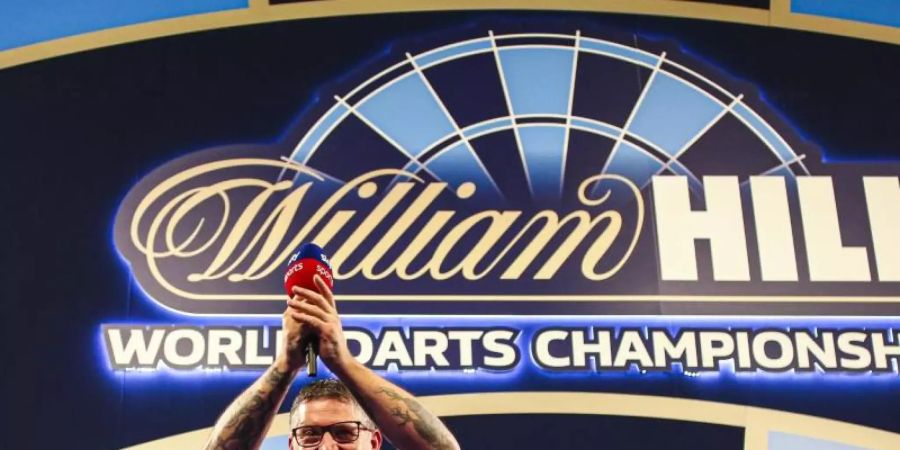 Gary Anderson jubelt nach seinem Sieg. Foto: Kieran Cleeves/PA Wire/dpa