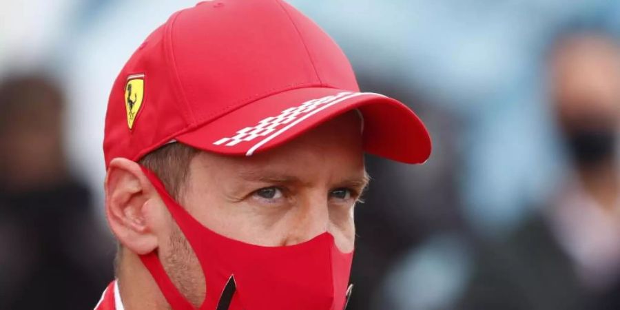 Rennfahrer Sebastian Vettel vom Team Ferrari darf sich auf einer neuen Strecke in Portugal ausprobieren. Foto: Francois Lenoir/POOL REUTERS/AP/dpa