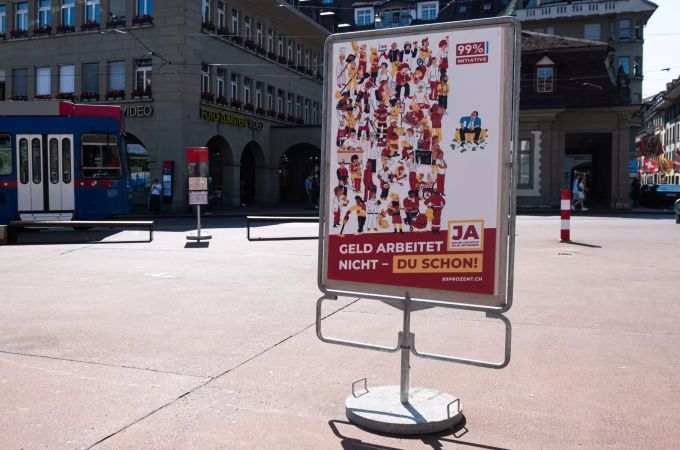 Ein Plakat, welches für eine Annahme der 99%-Initiative wirbt. 99%-Initiative