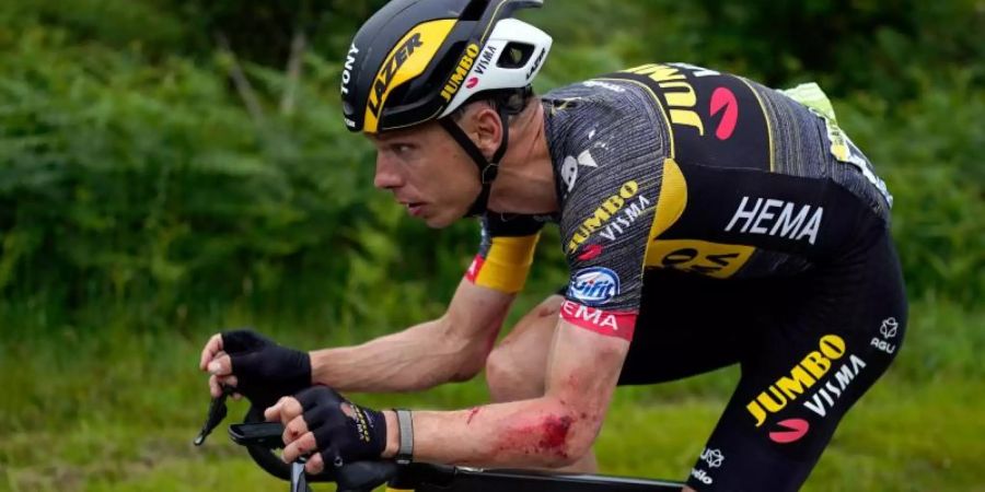 Gibt nach einem weiteren Sturz auf: Tony Martin. Foto: Daniel Cole/AP/dpa