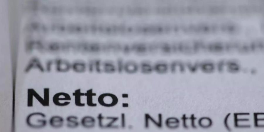 Für viele Tarifbeschäftigte ergaben sich im zweiten Quartal Reallohnverluste. Foto: Jens Büttner/dpa-Zentralbild/ZB
