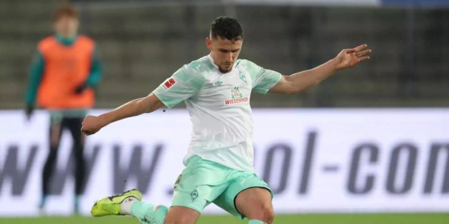 Werder-Verteidiger Milos Veljkovic ist für das kommende Bundesliga-Spiel beim VfB Stuttgart fraglich. Foto: Friso Gentsch/dpa
