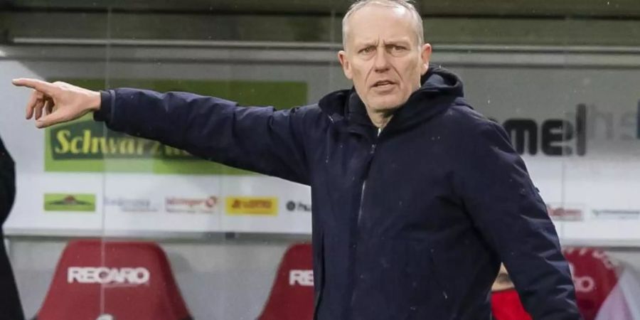 Fühlt sich in Freiburg weiterhin wohl: SC-Coach Christian Streich. Foto: Tom Weller/dpa