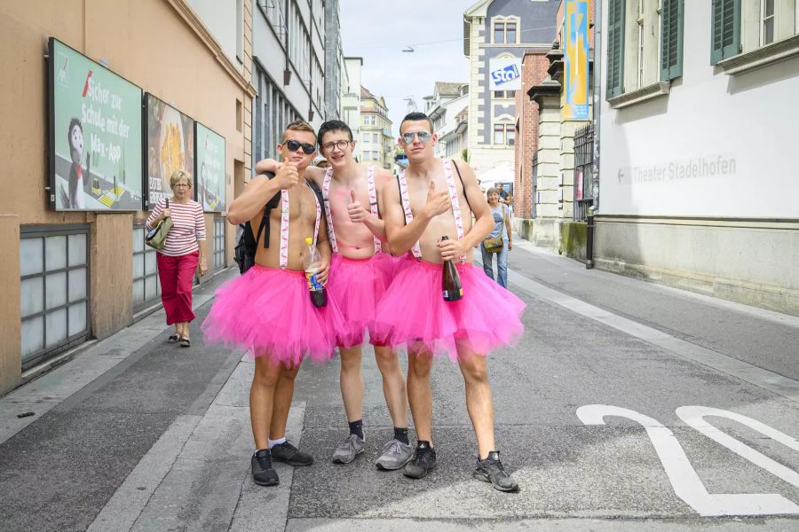 Participants dancing and partying the streets during the 28th Street Parade, an annual dance music parade, in the city center and around the lake of Zurich, Switzerland, Saturday, August 10, 2019. (KEYSTONE/Melanie Duchene)