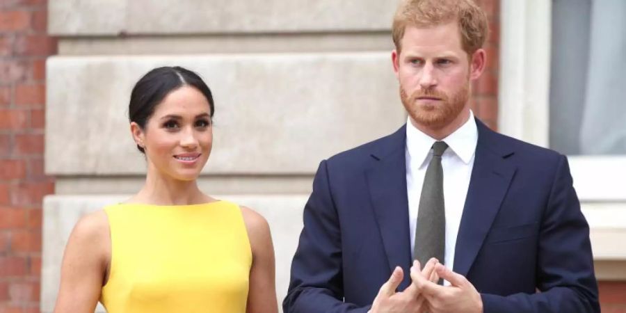 Prinz Harry von Grossbritannien und seine Frau Meghan in den Schlagzeilen. Foto: Yui Mok/PA Wire/dpa