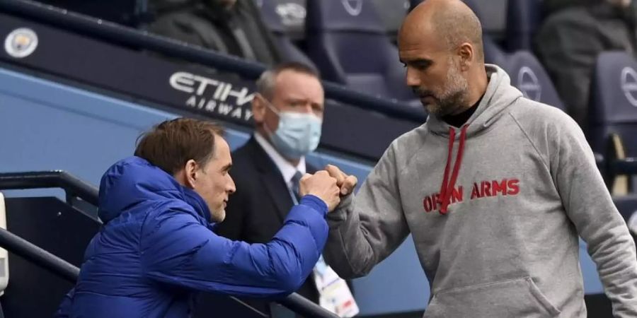 Man-City-Trainer Pep Guardiola (r) und Chelsea-Coach Thomas Tuchel sind befreundet. Foto: Shaun Botterill/Pool Getty/AP/dpa