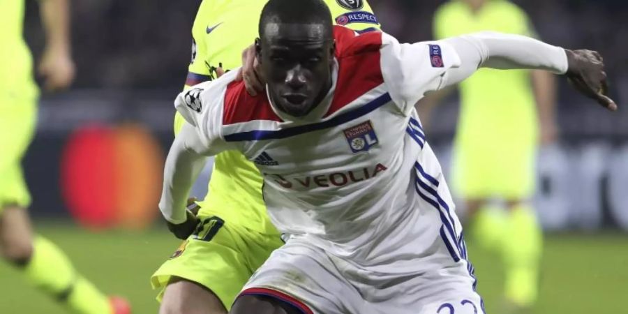 Ferland Mendy (vorn, in Aktion für Olympique Lyon) wechselt zu Real Madrid. Foto: Laurent Cipriani/AP