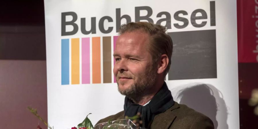 Der Schweizer Autor Christian Kracht wurde 2016 für sein Werk «Die Toten» mit dem Schweizer Buchpreis ausgezeichnet. Jetzt hat er seinen Roman «Eurotrash» von der Liste der Nominierten zurückgezogen. (Archivbild)