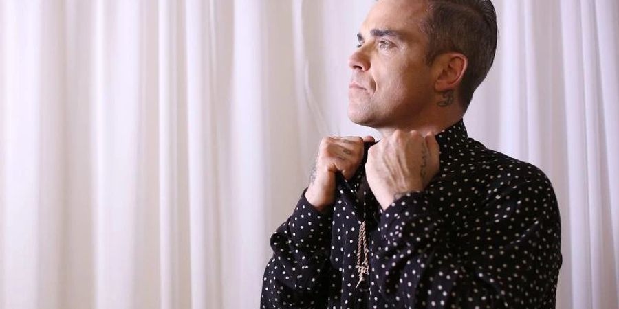 Entertainer und Familienvater: Robbie Williams feiert am Sonntag Geburtstag. Foto: David Moir/AAP/dpa/Archiv