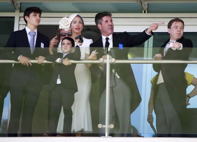 Simon Cowell und Lauren Silvermann mit ihrem gemeinsamen Sohn Eric (7). Simon Cowell Familie