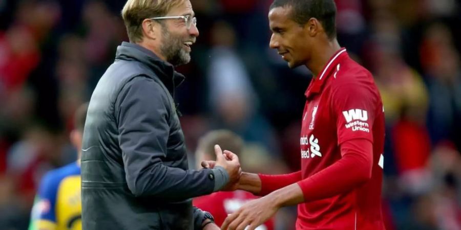 In Liverpool erfolgreich: Coach Jürgen Klopp und Joel Matip. Foto: Dave Thompson/PA Wire