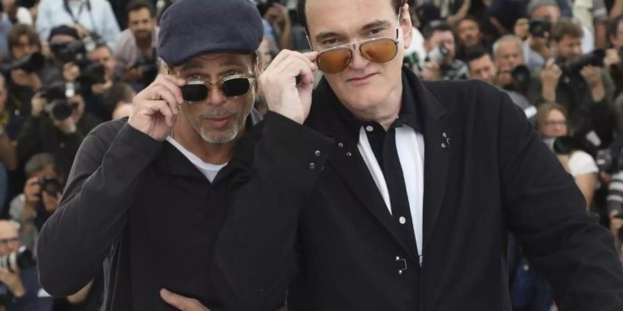 Männer mit Brille: Quentin Tarantino und Brad Pitt. Foto: Vianney Le Caer/Invision