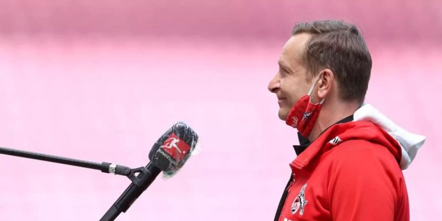 Horst Heldt hat den gelungenen Neustart der Fussball-Bundesliga nach der Corona-Zwangspause mit Freude kommentiert. Foto: Lars Baron/Getty/Pool/dpa