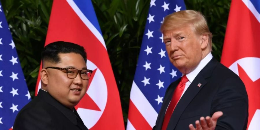 Kim (l.) und Trump