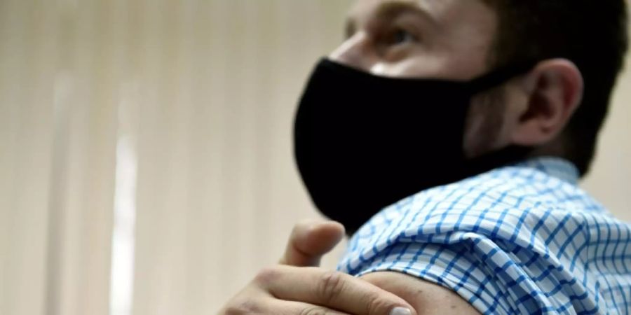 Teilnehmer von Impftofftest in Moskau