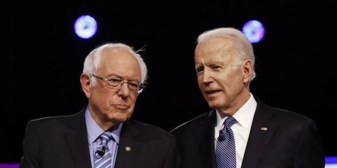 Wollen US-Präsident werden: Bernie Sanders (l) und Joe Biden. Foto: Matt Rourke/AP/dpa sanders biden