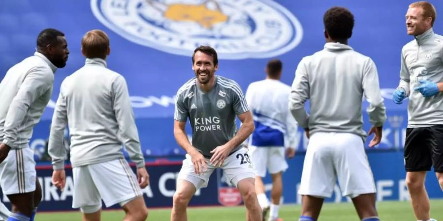 Business as usual: Die Spieler von Leicester City beim Aufwärmen. Foto: Rui Vieira/Nmc Pool/PA Wire/dpa