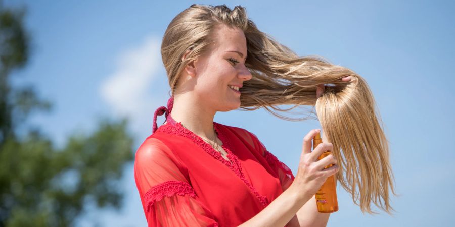 Frau Haar Sonnenschutz Spray