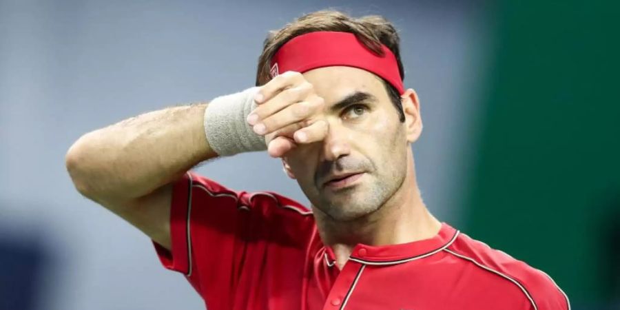 Liess Peter Gojowczyk in Basel keine Chance: Lokalmatador Roger Federer. Foto: Wu Gang/XinHua/dpa