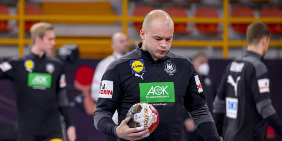 Die deutschen Handballer um Paul Drux nehmen nun Olympia ins Visier. Foto: Sascha Klahn/dpa