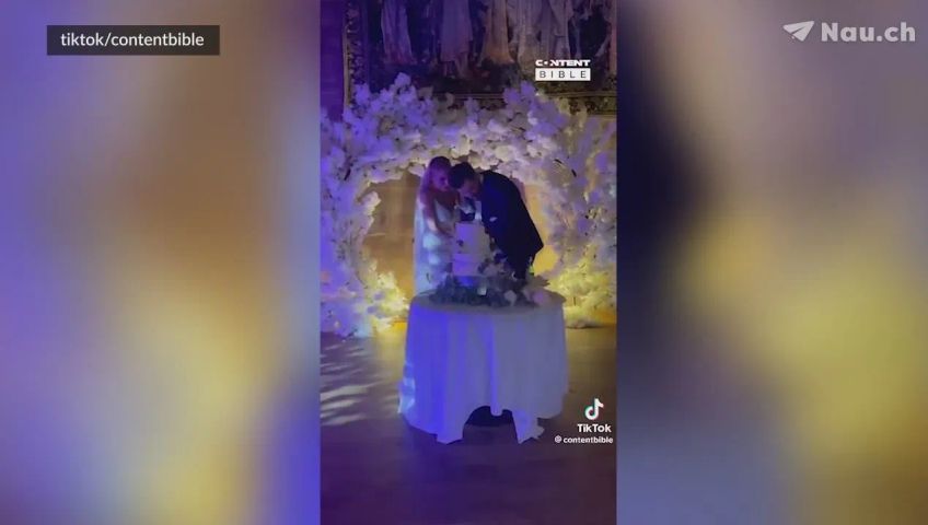 man-smashes-wedding-cake