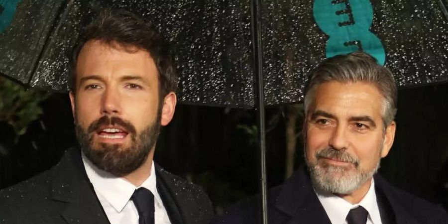 Dier beiden Batmans: Ben Affleck (l) und George Clooney. Foto: Karel Prinsloo/EPA/