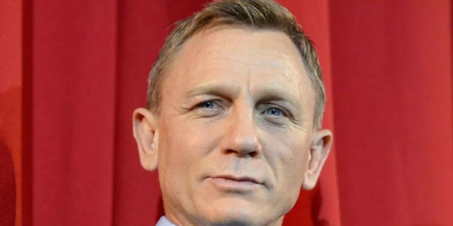 Daniel Craig kommt als James Bond erst im November zum Einsatz. Foto: Britta Pedersen/dpa