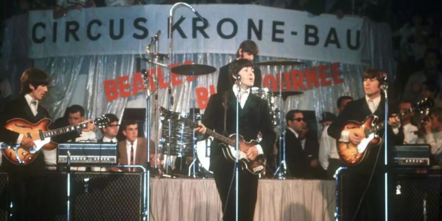 Die Beatles 1966 im Münchner Circus Krone-Bau. Foto: Gerhard Rauchwetter/dpa