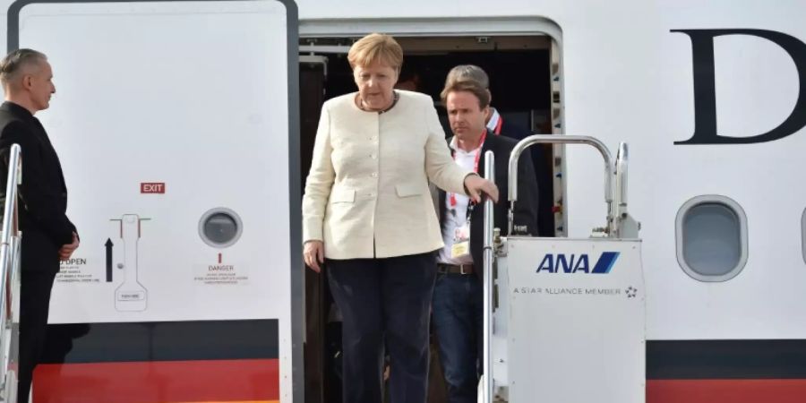 Merkel bei Ankunft in Osaka