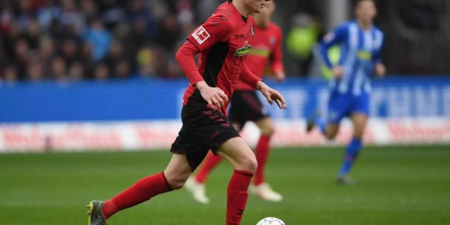 Philipp Lienhart und der SC Freiburg haben ihre Zusammenarbeit vorzeitig verlängert. Foto: Patrick Seeger
