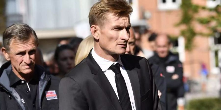 Nachdenklich: André Greipel bei der Trauerfeier des verstorbenen Bjorg Lambrecht. Foto: Dirk Waem/BELGA