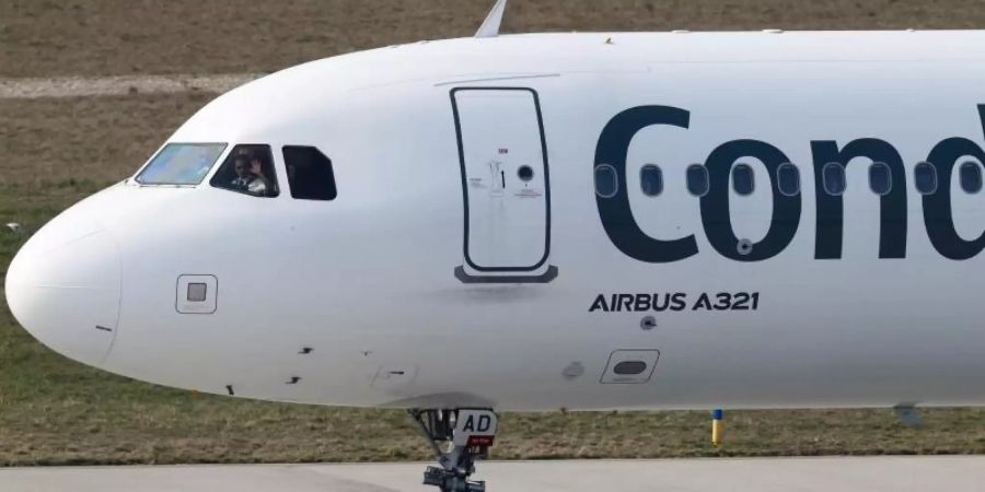 Eine Maschine von Condor musste kurz nach dem Start notlanden. Foto: Jan Woitas/dpa-Zentralbild/dpa/Symbolbild