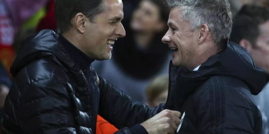 Treffen im Rückspiel mit ihren Teams aufeinander: PSG-Coach Thomas Tuchel (L) und sein ManUnited-Gegenüber Ole Gunnar Solskjaer. Foto: Dave Thompson