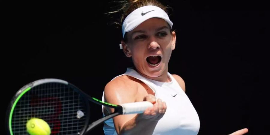 Simona Halep während ihres Spiels gegen die Belgierin Elise Mertens. Foto: Scott Barbour/AAP/dpa