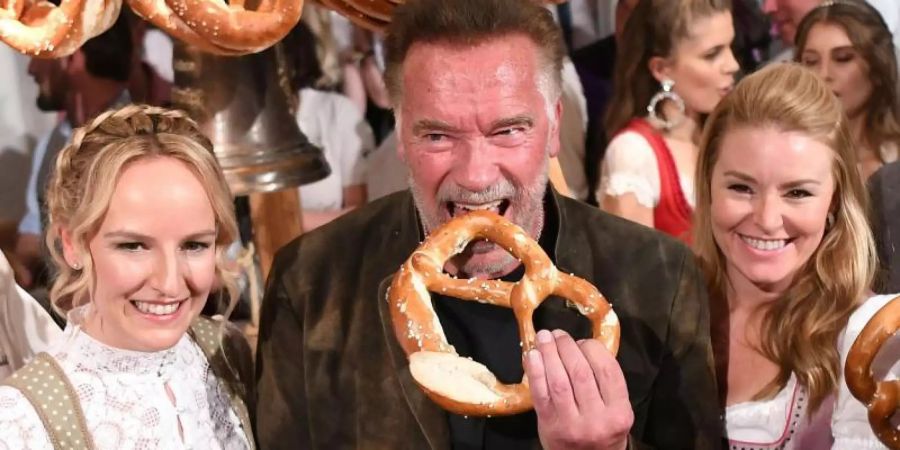 Arnold Schwarzenegger ist Stammgast beim Hahnenkamm-Rennen. Foto: Helmut Fohringer/APA/dpa