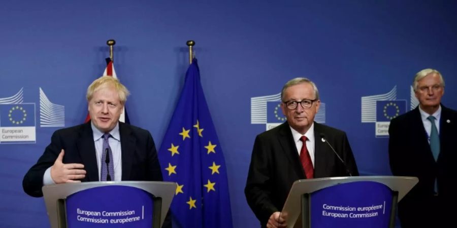 Boris Johnson, Jean-Claude Juncker und Michel Barnier (v.l.n.r.)